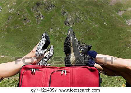 Couple on the mountain. Italy, Piedmont Alps, Formazza Valley. View Large Photo Image Stock Photo - Couple on the mountain. Italy, Piedmont Alps, Formazza Valley.. Fotosearch