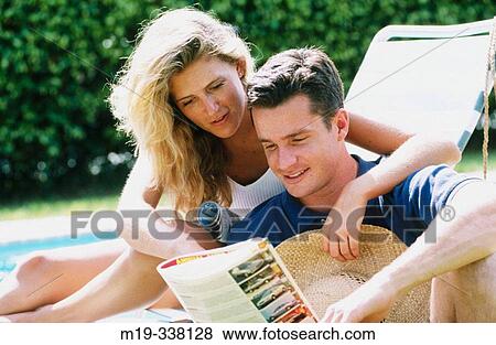 couple poolside View Large Photo Image Stock Photo - couple poolside. Fotosearch