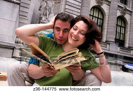 Couple reading a book View Large Photo Image Stock Photography - Couple reading a book. Fotosearch