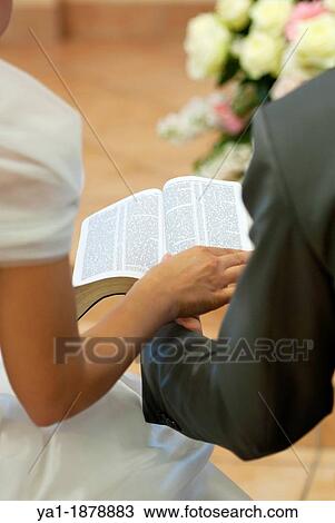 Couple reading together Bible during Christian wedding ceremony, Firenze, Tuscany, Italy View Large Photo Image Stock Image - Couple reading together Bible during Christian wedding ceremony, Firenze, Tuscany, Italy. Fotosearch