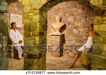 Couple relaxing after a sauna. Caldes de Boi Spa, Bo? valley. Lleida province. Catalonia. Spain. View Large Photo Image Stock Photo - Couple relaxing after a sauna. Caldes de Boi Spa, Bo? valley. Lleida province. Catalonia. Spain.. Fotosearch