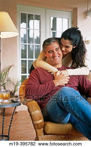 couple relaxing enjoying a moment together View Large Photo Image Stock Image - couple relaxing enjoying a moment together. Fotosearch