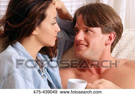 couple relaxing together View Large Photo Image Stock Photo - couple relaxing together. Fotosearch