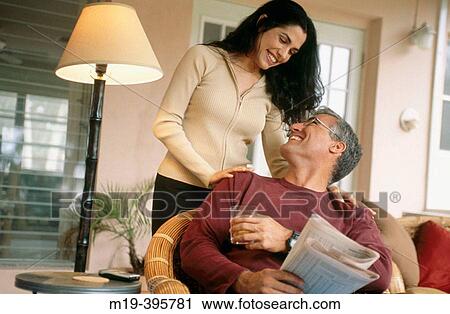 couple relaxing/enjoying a moment together View Large Photo Image Stock Image - couple relaxing/enjoying a moment together. Fotosearch