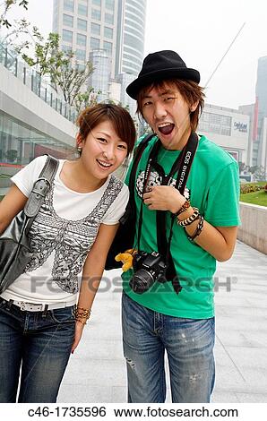 Couple, Renmin Guangchang, People's Square, Shanghai, China. View Large Photo Image Stock Photograph - Couple, Renmin Guangchang, People's Square, Shanghai, China.. Fotosearch