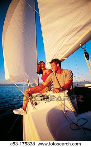 Couple sailing on Great Salt Lake. Utah. USA View Large Photo Image Stock Photo - Couple sailing on Great Salt Lake. Utah. USA. Fotosearch