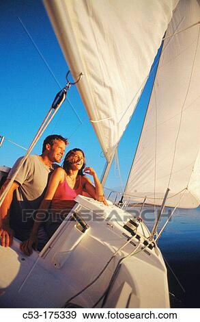 Couple sailing on Great Salt Lake. Utah. USA View Large Photo Image Stock Photo - Couple sailing on Great Salt Lake. Utah. USA. Fotosearch