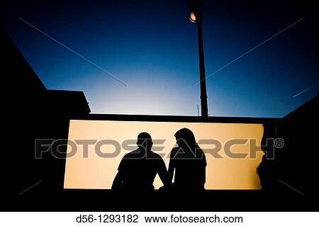 couple seated at a metro station, Valencia, Spain View Large Photo Image Stock Image - couple seated at a metro station, Valencia, Spain. Fotosearch