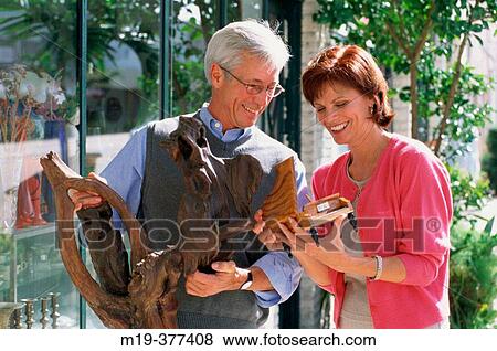 couple shopping for antiques View Large Photo Image Stock Photo - couple shopping for antiques. Fotosearch