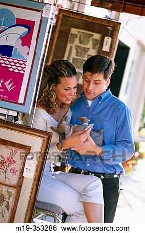 couple shopping for antiques View Large Photo Image Stock Photograph - couple shopping for antiques. Fotosearch