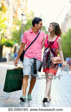 Couple shopping. Plaza de Gipuzkoa. San Sebastian. Donostia. Gipuzkoa. Basque Country. Spain. View Large Photo Image Stock Image - Couple shopping. Plaza de Gipuzkoa. San Sebastian. Donostia. Gipuzkoa. Basque Country. Spain.. Fotosearch