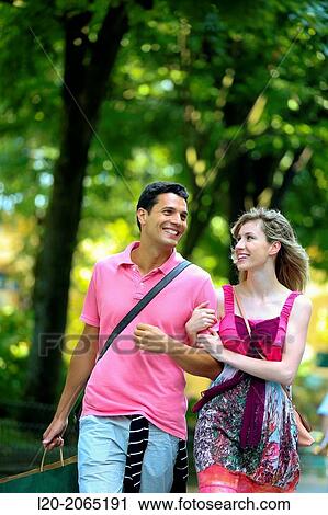 Couple shopping. Plaza de Gipuzkoa. San Sebastian. Donostia. Gipuzkoa. Basque Country. Spain. View Large Photo Image Stock Image - Couple shopping. Plaza de Gipuzkoa. San Sebastian. Donostia. Gipuzkoa. Basque Country. Spain.. Fotosearch