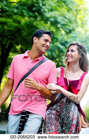 Stock Image - Couple shopping. Plaza de Gipuzkoa. San Sebastian. Donostia. Gipuzkoa. Basque Country. Spain.. Fotosearch