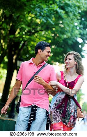 Couple shopping. Plaza de Gipuzkoa. San Sebastian. Donostia. Gipuzkoa. Basque Country. Spain. View Large Photo Image Stock Photo - Couple shopping. Plaza de Gipuzkoa. San Sebastian. Donostia. Gipuzkoa. Basque Country. Spain.. Fotosearch