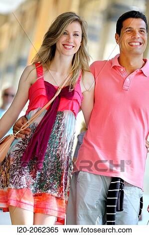 Couple shopping. Plaza de Gipuzkoa. San Sebastian. Donostia. Gipuzkoa. Basque Country. Spain. View Large Photo Image Stock Photography - Couple shopping. Plaza de Gipuzkoa. San Sebastian. Donostia. Gipuzkoa. Basque Country. Spain.. Fotosearch
