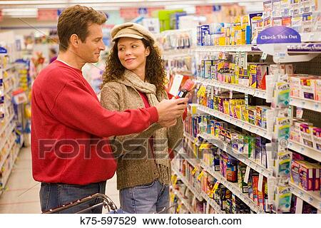 Stock Photo - Couple shopping. Fotosearch