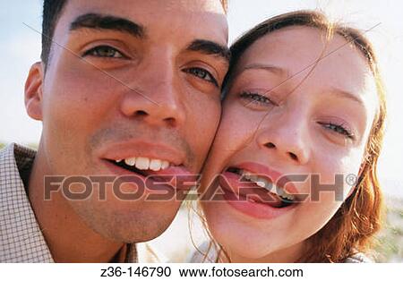 Couple showing tongues View Large Photo Image Stock Image - Couple showing tongues. Fotosearch