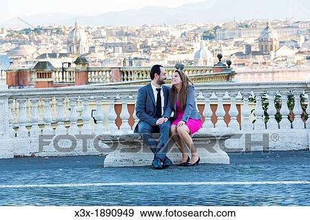 Couple sitting Gianicolo in Rome Italy View Large Photo Image Stock Photo - Couple sitting Gianicolo in Rome Italy. Fotosearch