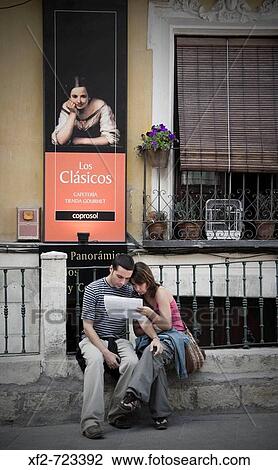 Couple sitting in old town, Cuenca. Castilla-La Mancha, Spain View Large Photo Image Stock Image - Couple sitting in old town, Cuenca. Castilla-La Mancha, Spain. Fotosearch