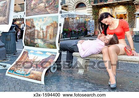 Couple sitting in Piazza Navona Rome Italy View Large Photo Image Stock Image - Couple sitting in Piazza Navona Rome Italy. Fotosearch
