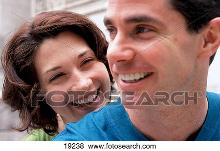 Stock Photo - Couple smiling. Fotosearch
