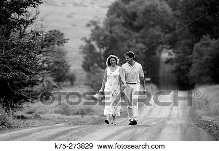 Couple strolling View Large Photo Image Stock Photo - Couple strolling. Fotosearch