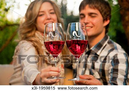Couple toasting with wine. Navarre. Spain View Large Photo Image Stock Photography - Couple toasting with wine. Navarre. Spain. Fotosearch