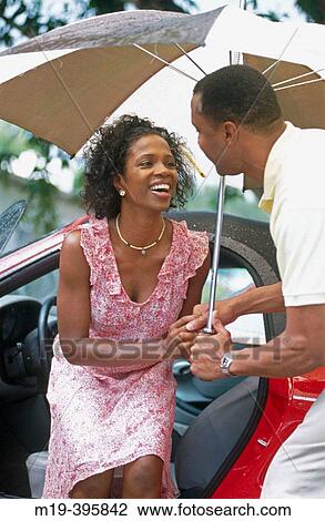 couple under an umbrella View Large Photo Image Stock Image - couple under an umbrella. Fotosearch