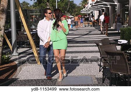 Couple walking in lincoln road Miami Beach View Large Photo Image Stock Photo - Couple walking in lincoln road Miami Beach. Fotosearch