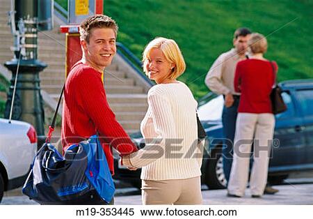 Couple walking together View Large Photo Image Stock Photography - Couple walking together. Fotosearch