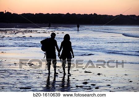 Couple walking, Zurriola Beach, Donostia, San Sebastian, Gipuzkoa, Basque Country, Spain View Large Photo Image Stock Photo - Couple walking, Zurriola Beach, Donostia, San Sebastian, Gipuzkoa, Basque Country, Spain. Fotosearch