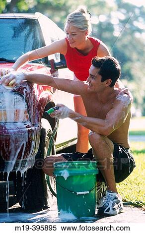 couple washing their car View Large Photo Image Stock Photography - couple washing their car. Fotosearch