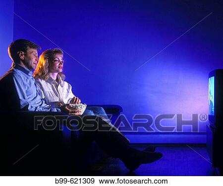 couple watching television View Large Photo Image Stock Photo - couple watching television. Fotosearch