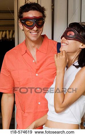 couple wearing mask View Large Photo Image Stock Photo - couple wearing mask. Fotosearch