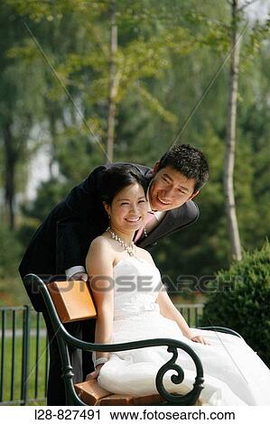 Stock Image - Couple Wedding Garden. Fotosearch