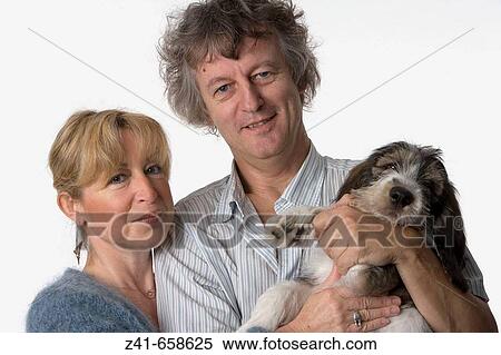 Couple with dog View Large Photo Image Stock Photography - Couple with dog. Fotosearch