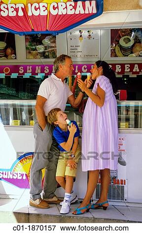 Couple with pregnant woman and boy eating ice creams View Large Photo Image Stock Photo - Couple with pregnant woman and boy eating ice creams. Fotosearch