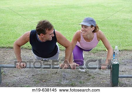 Couple working out together View Large Photo Image Stock Photography - Couple working out together. Fotosearch