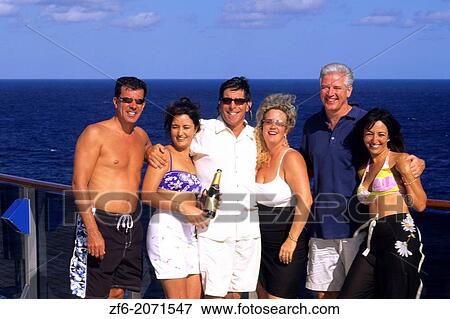 Couples relax on cruise ship vacation enjoy pizza and drinks. View Large Photo Image Stock Photo - Couples relax on cruise ship vacation enjoy pizza and drinks.. Fotosearch