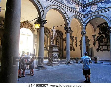 Courtyard of the Columns, also known as Michelozzo's Courtyard (Cortile delle Colonne or Cortile di Michelozzo). The statue is Baccio Bandinelli's Orpheus placating Cerberus with his song. Palazzo Medici-Ricardi. Florence, Tuscany, Italy, Europe View Large Photo Image Stock Photo - Courtyard of the Columns, also known as Michelozzo's Courtyard (Cortile delle Colonne or Cortile di Michelozzo). The statue is Baccio Bandinelli's Orpheus placating Cerberus with his song. Palazzo Medici-Ricardi. Florence, Tuscany, Italy, Europe. Fotosearch