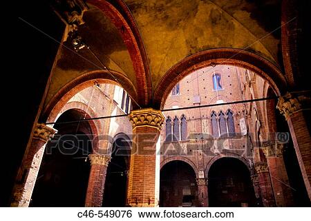 Stock Photograph - Courtyard of the? Podest?? (governor), Palazzo Pubblico (seat of civil government). Siena. Tuscany, Italy. Fotosearch