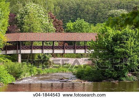 Covered bridge spanning one arm of the river Fulda in Hannoversch Muenden, German Fairy Tale Route, Lower Saxony, Germany, Europe View Large Photo Image Stock Image - Covered bridge spanning one arm of the river Fulda in Hannoversch Muenden, German Fairy Tale Route, Lower Saxony, Germany, Europe. Fotosearch