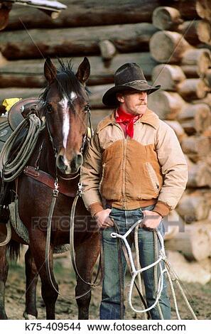 Cowboy and his horse View Large Photo Image Picture - Cowboy and his horse. Fotosearch