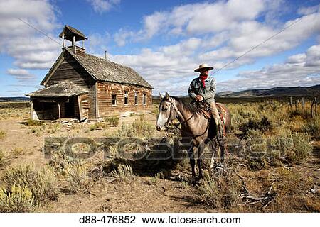 Cowboy and old 1900s school. Ponderosa Ranch. Seneca. Oregon. USA View Large Photo Image Stock Image - Cowboy and old 1900s school. Ponderosa Ranch. Seneca. Oregon. USA. Fotosearch