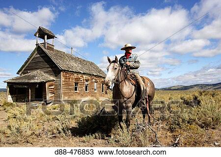 Cowboy and old 1900s school. Ponderosa Ranch. Seneca. Oregon. USA View Large Photo Image Stock Image - Cowboy and old 1900s school. Ponderosa Ranch. Seneca. Oregon. USA. Fotosearch
