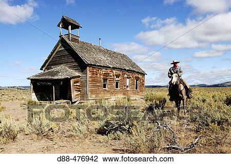 Cowboy and old 1900s school. Ponderosa Ranch. Seneca. Oregon. USA View Large Photo Image Stock Image - Cowboy and old 1900s school. Ponderosa Ranch. Seneca. Oregon. USA. Fotosearch