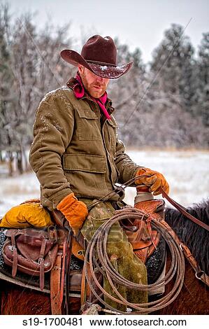 Cowboy on horse View Large Photo Image Stock Image - Cowboy on horse. Fotosearch