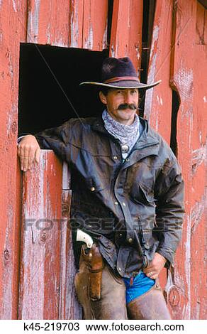 Stock Image - Cowboy, Ponderosa Ranch near Seneca, Central Oregon, USA. Fotosearch