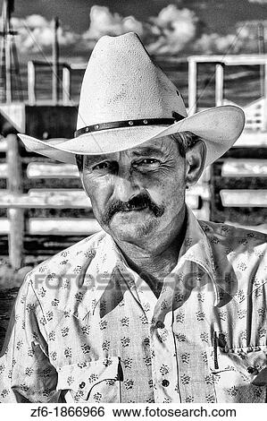 Stock Photograph - Cowboy Portrait of western lifestyle in Wyoming USA. Fotosearch