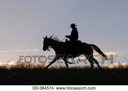 Cowboy silhouette. Montana. USA View Large Photo Image Picture - Cowboy silhouette. Montana. USA. Fotosearch